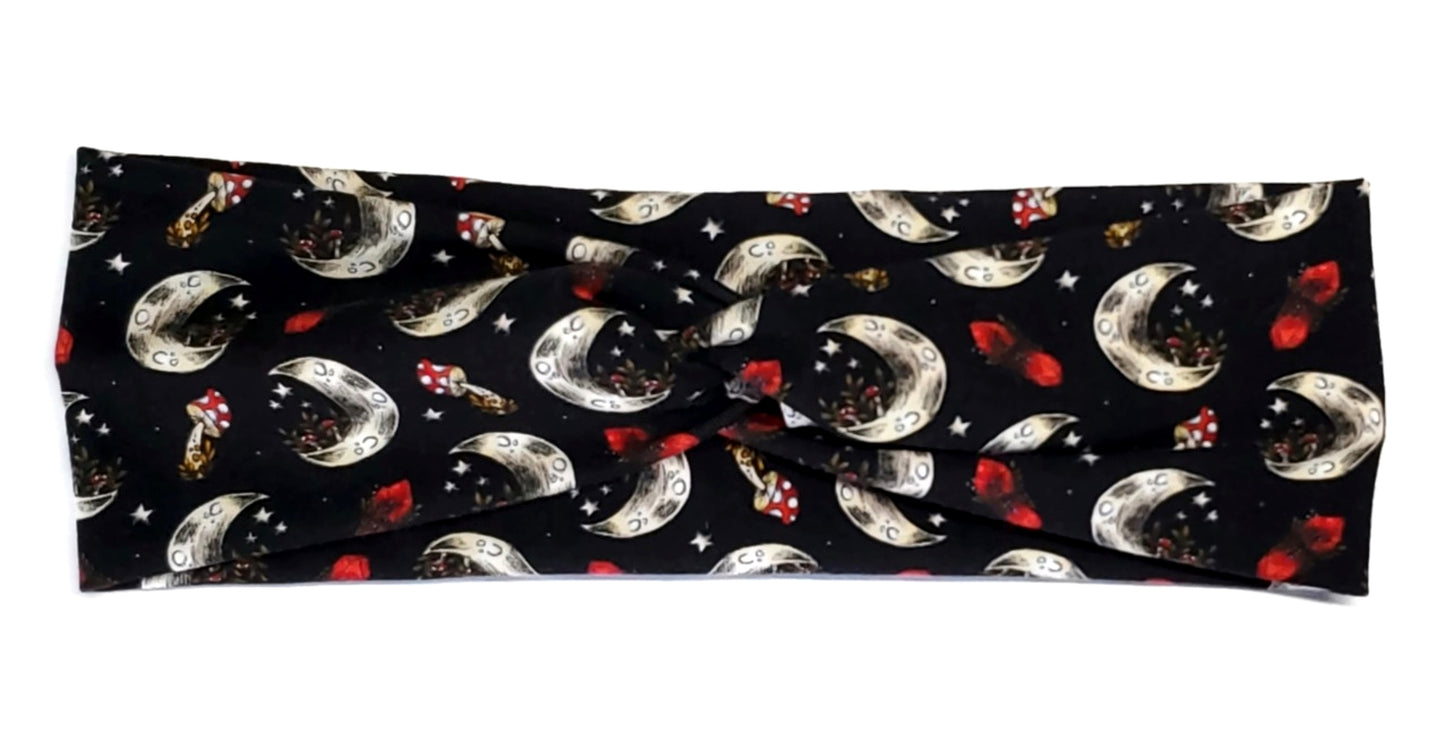 Dark Cottagecore style red Mushrooms and crystals with crescent moons and stars on a black twist headwrap headband for Women