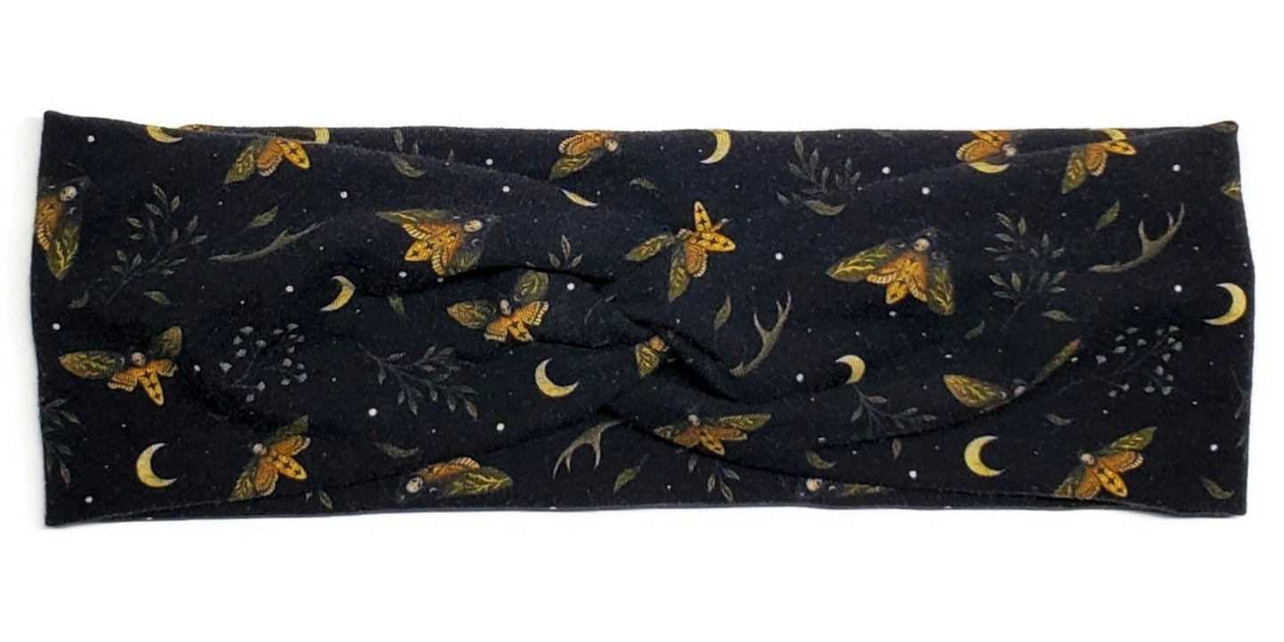 Dark cottagecore style yellow death moths and moons on a black twist headband for women