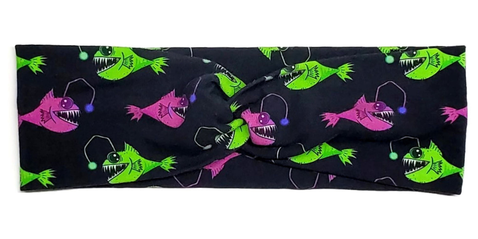 Green and Pink spooky cute angler fish on a black cotton twist headband for women