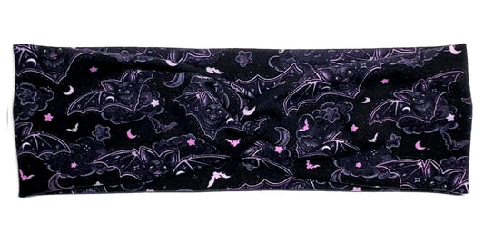 Pastel Goth Pink Bats stars and moons on a black twist headwrap headband for women